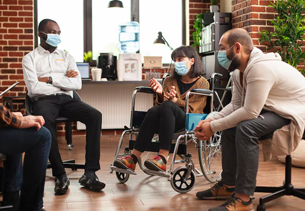Respiratory Therapist helping a patient